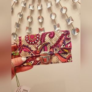 NWT. Vera Bradley pink coin wallet. No flaws.